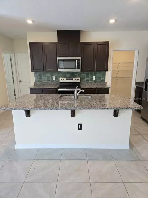 Kitchen - 2450 Taloncrest Ct, Eagle Lake, FL 33839 photo 1 of 2