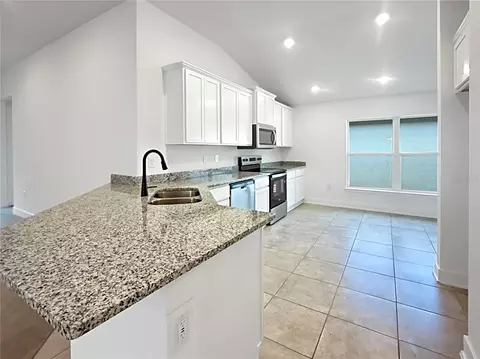 Kitchen - 7648 Bent Tree Loop, Saint Cloud, FL 34771 photo 2 of 2