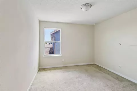 Bedroom - 5231 Villa Rosa Ave, Saint Cloud, FL 34771 photo 11 of 16