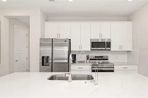 Kitchen - 7909 Draw St, Reunion, FL 34747 photo 1 of 5