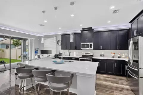 Kitchen - 5352 Costa Del Sol Dr, Saint Cloud, FL 34771 photo 3 of 4