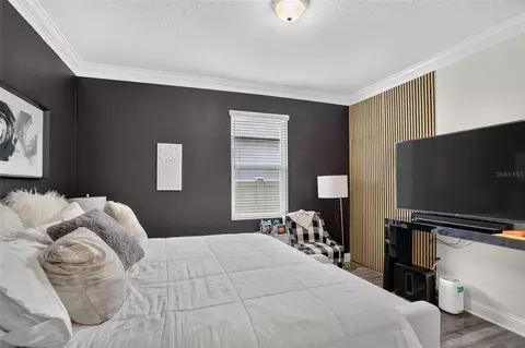 Bedroom - 5352 Costa Del Sol Dr, Saint Cloud, FL 34771 photo 7 of 7