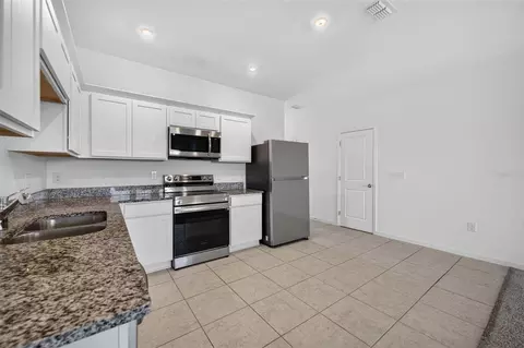 Kitchen - 381 Grand Pine Ln, Saint Cloud, FL 34771 photo 3 of 4