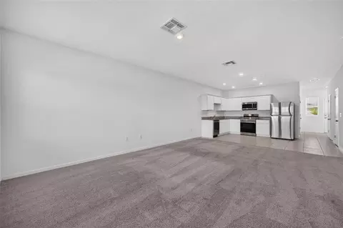 Living - 381 Grand Pine Ln, Saint Cloud, FL 34771 photo 4 of 6