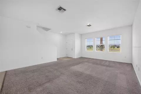 Living - 381 Grand Pine Ln, Saint Cloud, FL 34771 photo 3 of 6