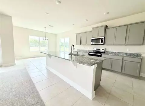 Kitchen - 7727 Bent Tree Loop, Saint Cloud, FL 34771 photo 2 of 2