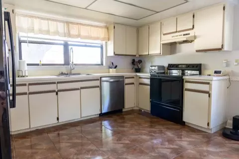 Kitchen - 1707 Whispering Dr E, Largo, FL 33771 photo 1 of 3