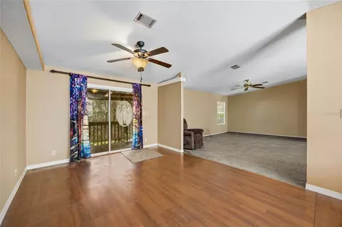 Living - 819 Lenore Ave, Interlachen, FL 32148 photo 3 of 4