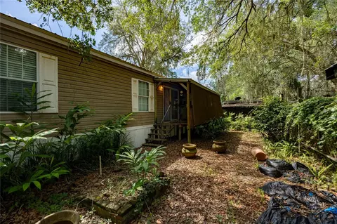 Exterior - 819 Lenore Ave, Interlachen, FL 32148 photo 4 of 10