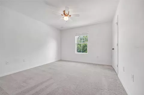 Bedroom - 4824 Poolside Dr, Saint Cloud, FL 34769 photo 3 of 4