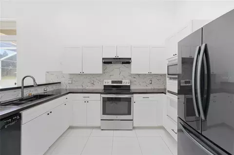 Kitchen - 7190 Six Gun Ct, Saint Cloud, FL 34771 photo 2 of 3
