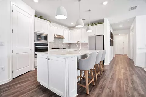 Kitchen - 11237 Rolling Fork Trl, Parrish, FL 34219 photo 3 of 9
