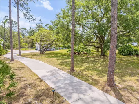 Exterior - 106 Pine Tree Dr, Ormond Beach, FL 32174 photo 4 of 31