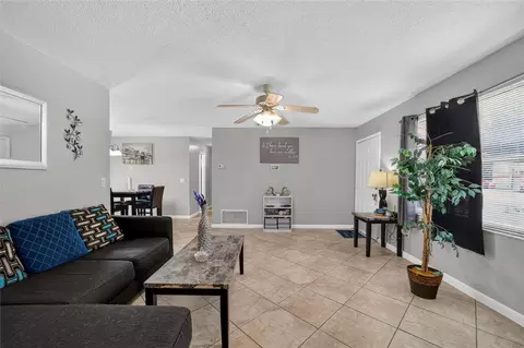 Living - 945 NW 64th Pl, Ocala, FL 34475 photo 1 of 2