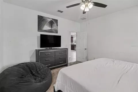 Bedroom - 5423 Dove Cottage Ln, Saint Cloud, FL 34771 photo 3 of 7