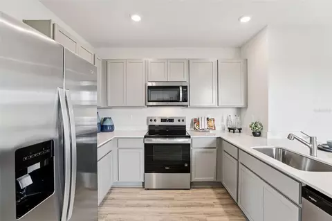 Kitchen - 5576 Taverna Loop, Winter Haven, FL 33884 photo 3 of 4