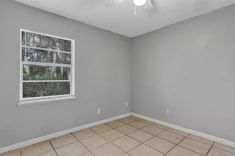 Bedroom - 3990 SE 17th Ct, Ocala, FL 34480 photo 5 of 16