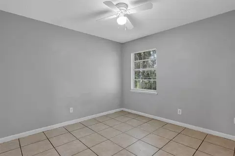 Bedroom - 3990 SE 17th Ct, Ocala, FL 34480 photo 4 of 16