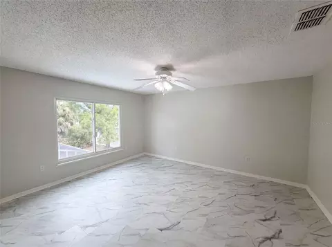 Living - 5191 Quintilis St, Spring Hill, FL 34608 photo 3 of 8