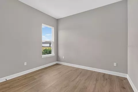 Bedroom - 998 Tassleflower Trl, Saint Cloud, FL 34771 photo 6 of 8
