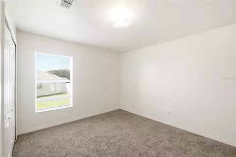 Bedroom - 10320 Vista Pines Loop, Clermont, FL 34711 photo 6 of 6