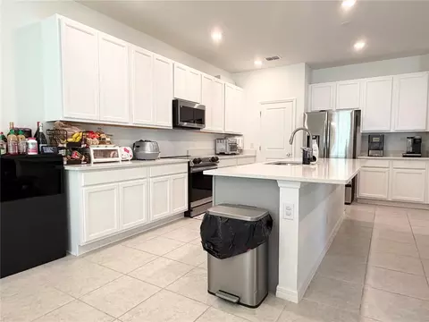 Kitchen - 1663 Meadowlark Dr, Deltona, FL 32725 photo 2 of 2