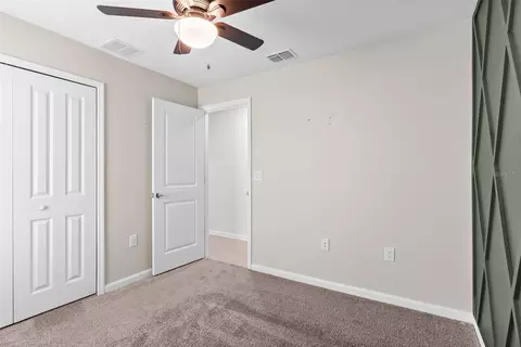 Bedroom - 5121 Four Strand Ct, Saint Cloud, FL 34772 photo 6 of 8