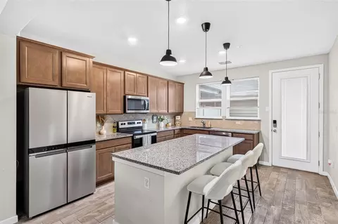 Kitchen - 5133 Sapling Sprout Dr, Orlando, FL 32829 photo 2 of 3