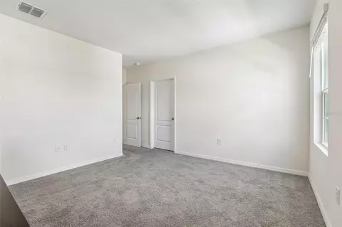 Bedroom - 2945 Elio Hammock Dr, Harmony, FL 34773 photo 10 of 11