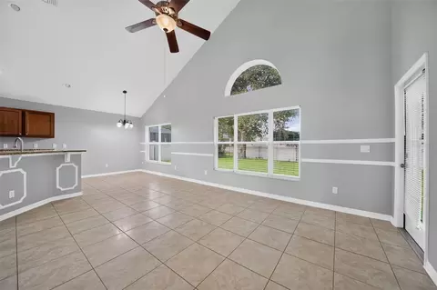 Living - 3519 Mccormick Woods Dr, Ocoee, FL 34761 photo 2 of 7