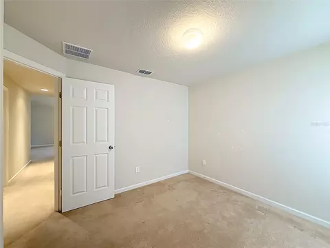 Bedroom - 5669 SW 40th St, Ocala, FL 34474 photo 16 of 16