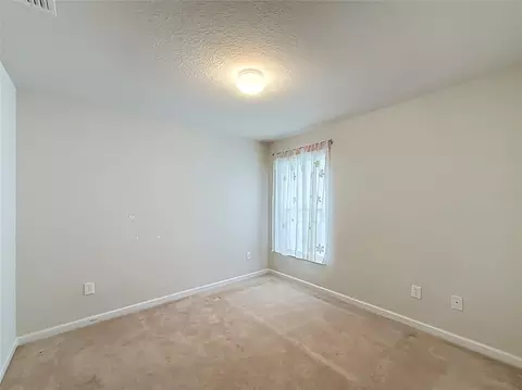 Bedroom - 5669 SW 40th St, Ocala, FL 34474 photo 13 of 16