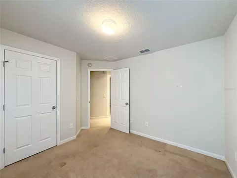 Bedroom - 5669 SW 40th St, Ocala, FL 34474 photo 15 of 16
