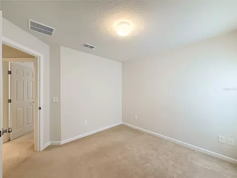 Bedroom - 5669 SW 40th St, Ocala, FL 34474 photo 10 of 16