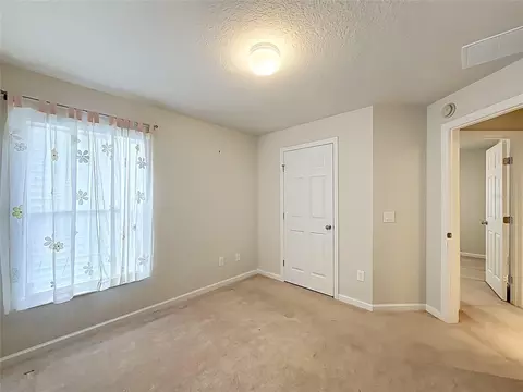 Bedroom - 5669 SW 40th St, Ocala, FL 34474 photo 14 of 16