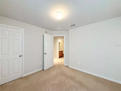 Bedroom - 5669 SW 40th St, Ocala, FL 34474 photo 11 of 16
