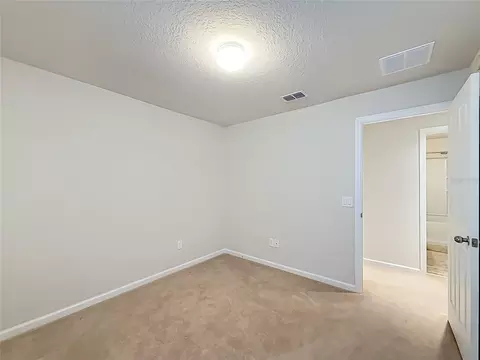 Bedroom - 5669 SW 40th St, Ocala, FL 34474 photo 4 of 16