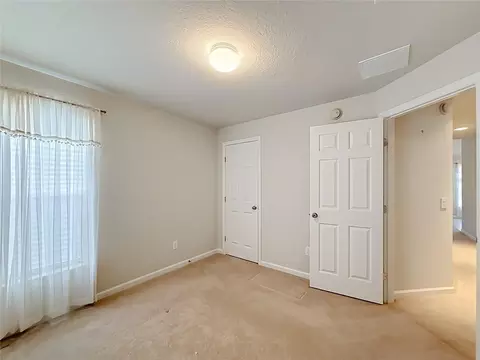Bedroom - 5669 SW 40th St, Ocala, FL 34474 photo 12 of 16