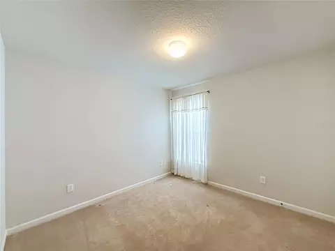 Bedroom - 5669 SW 40th St, Ocala, FL 34474 photo 9 of 16