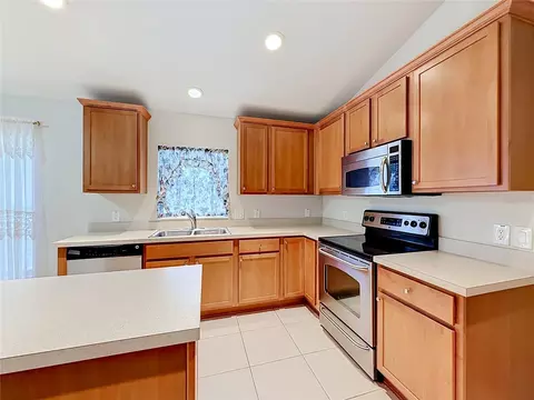 Kitchen - 5669 SW 40th St, Ocala, FL 34474 photo 2 of 8