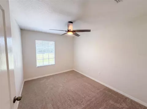 Bedroom - 13717 Rosette Rd, Hudson, FL 34669 photo 3 of 7