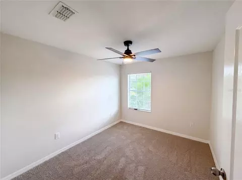 Bedroom - 13717 Rosette Rd, Hudson, FL 34669 photo 5 of 7