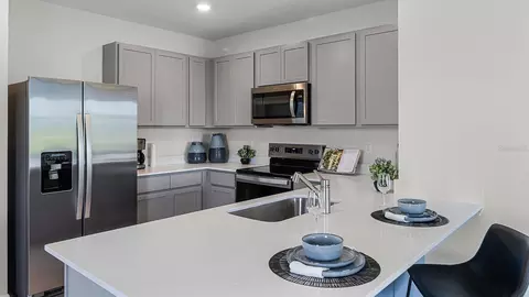 Kitchen - 5584 Taverna Loop, Winter Haven, FL 33884 photo 3 of 7