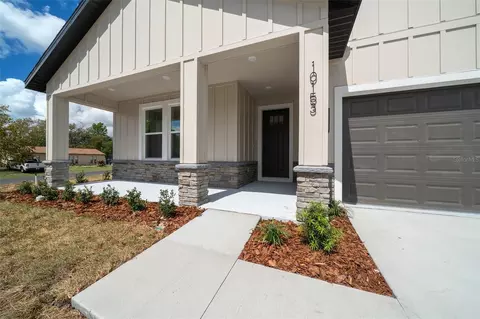 Exterior - 10153 Lynnhaven Rd, Spring Hill, FL 34608 photo 7 of 12