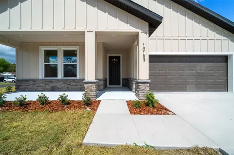 Exterior - 10153 Lynnhaven Rd, Spring Hill, FL 34608 photo 4 of 12