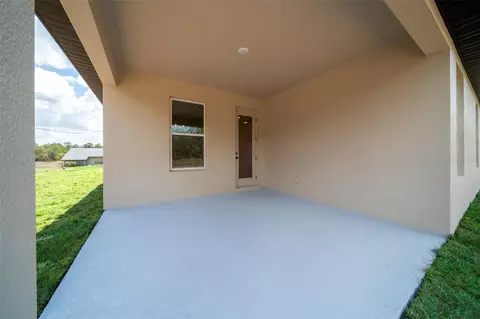Exterior - 10153 Lynnhaven Rd, Spring Hill, FL 34608 photo 9 of 12
