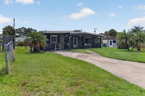 Exterior - 1865 Cedarwood Dr, Melbourne, FL 32935 photo 1 of 8