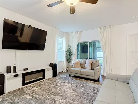 Living - 399 Pinecrest Loop, Davenport, FL 33837 photo 7 of 8