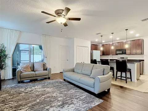 Living - 399 Pinecrest Loop, Davenport, FL 33837 photo 6 of 8