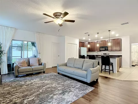 Living - 399 Pinecrest Loop, Davenport, FL 33837 photo 5 of 8